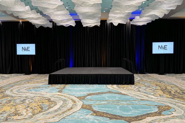 16' x 16' Stage with Black Drape & Uplighting