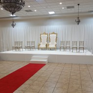 White Stage Top, White Drape, Red Carpet Runner & Gold Chiavari Chairs